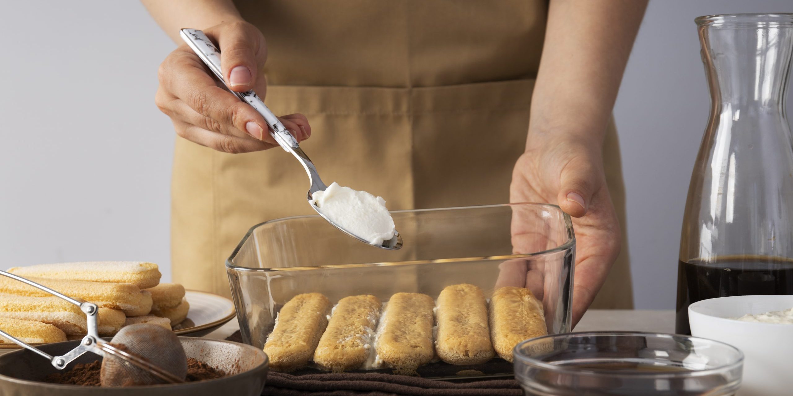 front-view-cook-preparing-tiramisu